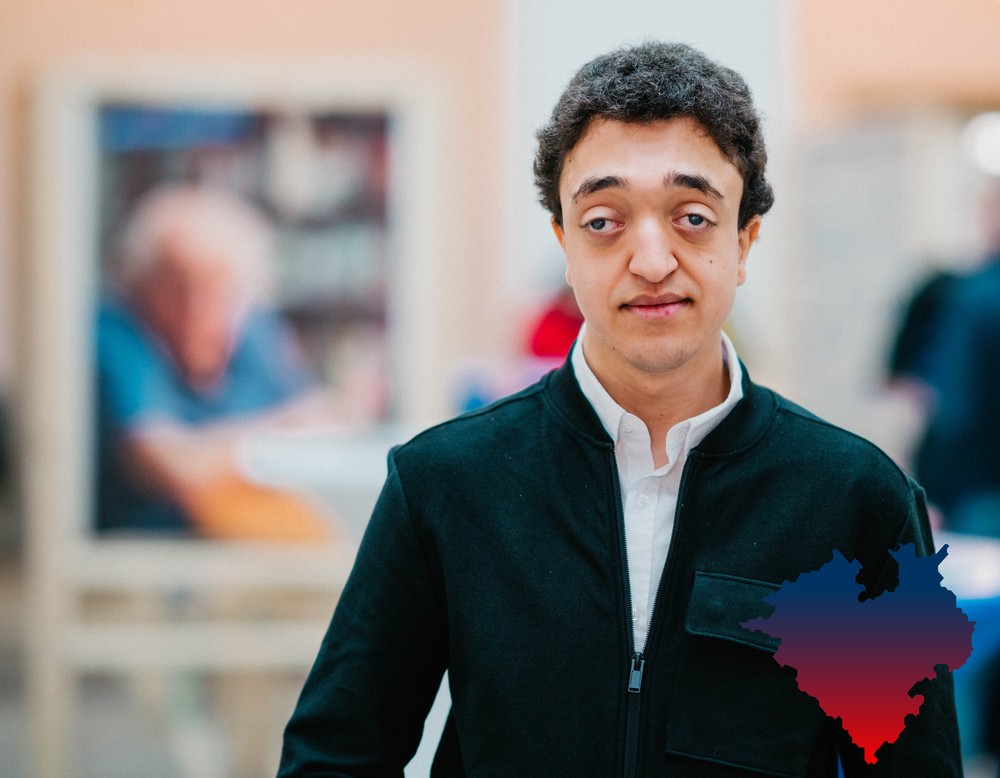 Porträtfoto von Mohammed Guebli. Unten rechts befindet sich ein illustriertes Westfalenherz.